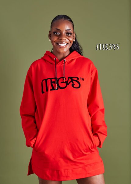 girl on hooded sweatshirt gown smiling