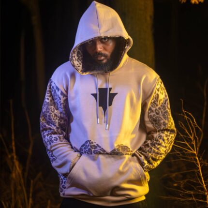 Man in the woods wearing Megas Jungz Hood