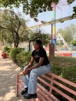 Big Naj of Abuja wearing Hot girls preach positivity by megas clothing